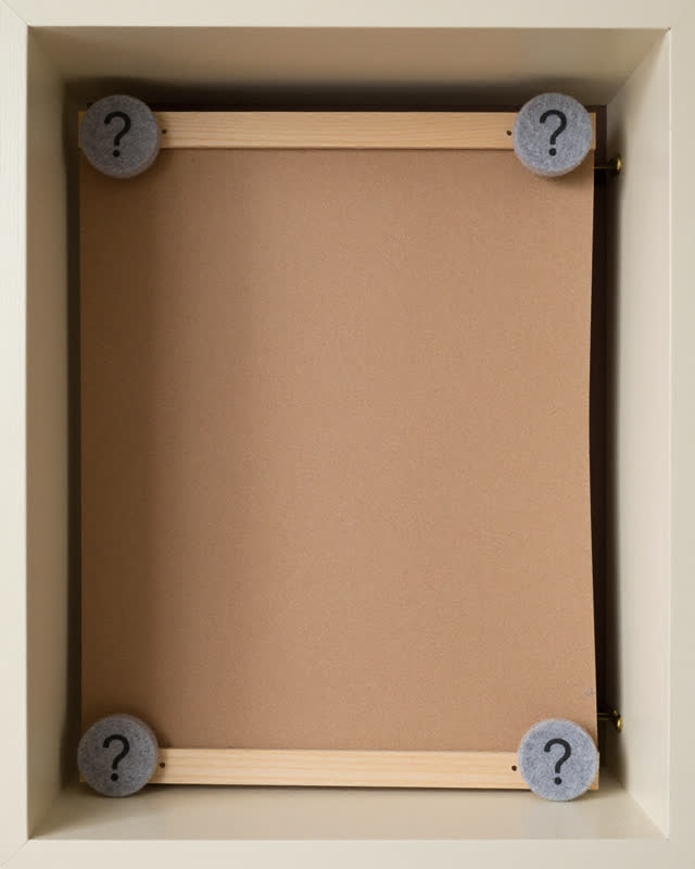 A community notice-frame repair alcove with no readable notices, empty of people, with no readable text, status labels,