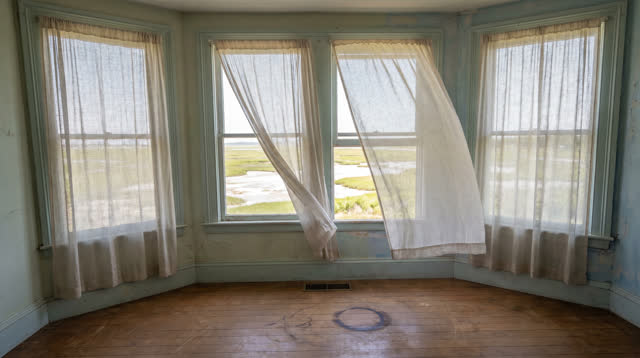 A buoyant first-person dream in an empty upper room beside a salt marsh at noon: four sheer linen curtains across separa