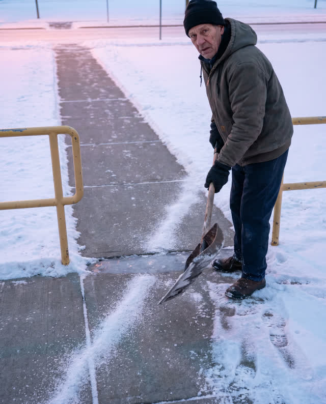 I dream of a snowy school walkway at cold early morning, before children arrive, where the salt line has one small gap.