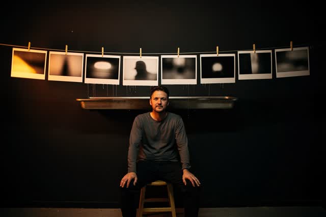 I dream of a small community darkroom after the last print is hung, quiet enough that the safelight keeps watch. One per