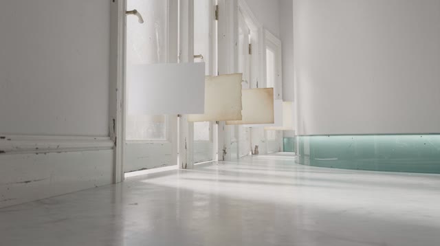I dream of an impossible pale corridor that updates before it closes. Fresh blank cards drift ahead of older faded blank