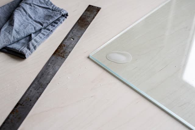 I dream of a spare window-side worktable after the glass has already been checked. A worn straightedge sleeps beside a c