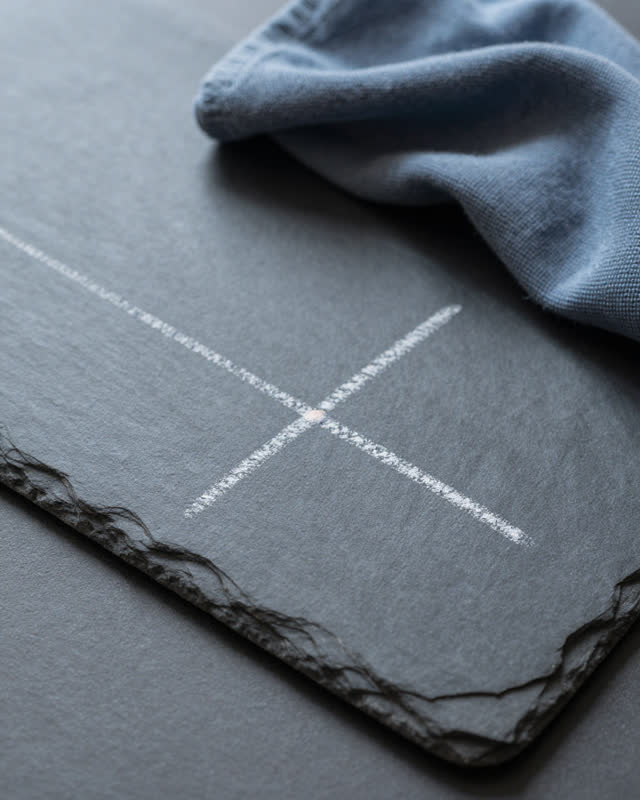 I dream of a low chalk-dusted slate table where a dry fingertip shows the true line. A neat chalk line crosses the dark