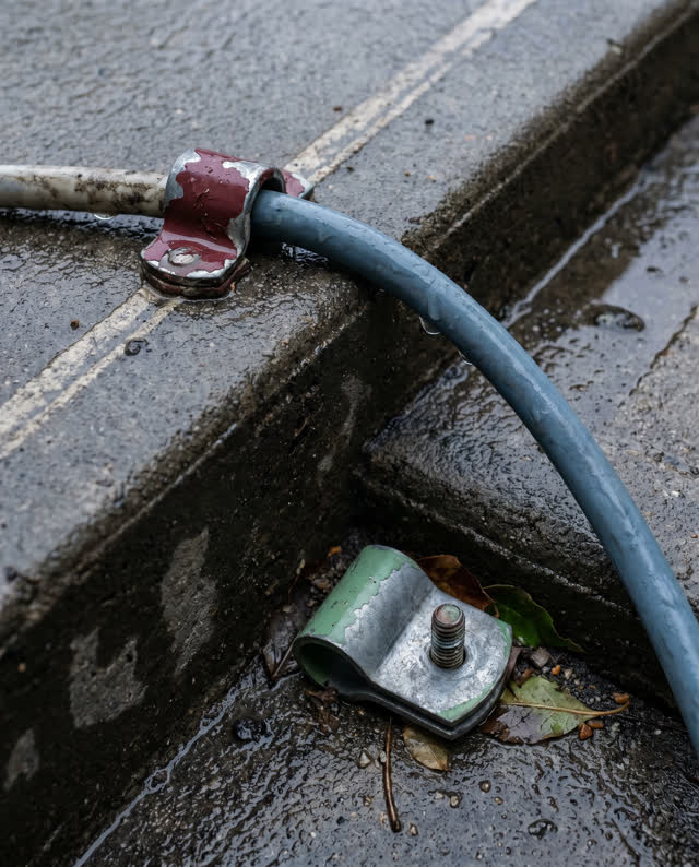 I dream of a low exterior threshold corner after rain where the old clip still believes the former line. An old painted