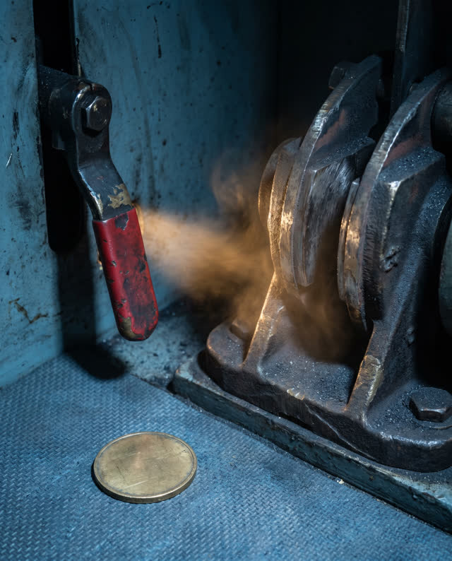 I dream of a small elevator brake room where the brake shoe dust has not settled. A released reset handle sits to the le