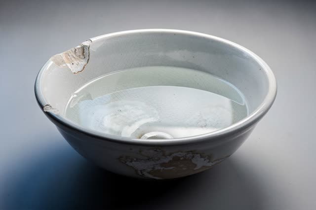 I dream of a chipped ceramic basin in open shade after rinsing, quiet because the handled thing has moved on. One soft d