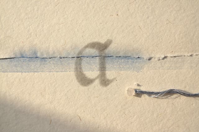 I dream of a nearly empty aged paper margin after inspection, quiet because nothing else has to prove itself. One soft n