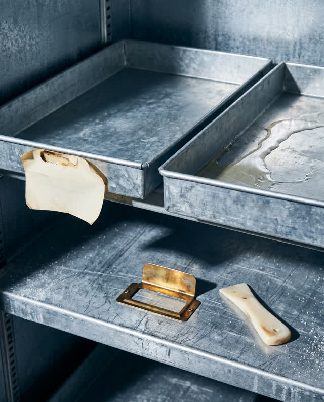 I dream of a cold storage shelf where the label still holds the wrong tray. On the left, an old blank cream label is stu