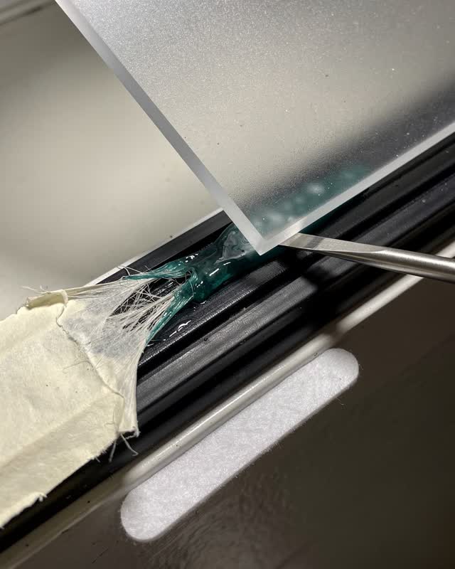 I dream of a clean stairwell utility niche where a frosted acrylic cover will not seat while the wash is still moving. T