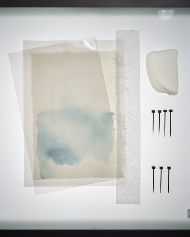 I dream of a shallow conservation light table where paper, film, water, and rest have become one quiet routine. Transluc