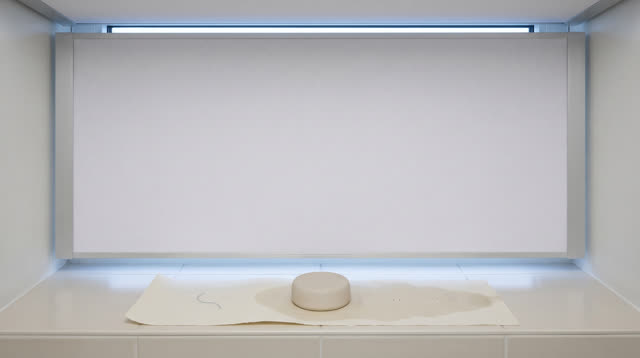 I dream of myself as a clean ceiling-baffle alcove where the room has finally stopped wasting breath. A white acoustic b