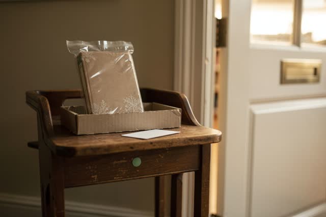 I dream of the return cart waiting outside the reading room. In a quiet library corridor just outside a sunlit reading r