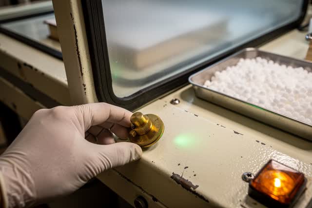 I dream of calibrating the room instead of touching the book. At a conservation timing bench beside a sealed acclimation