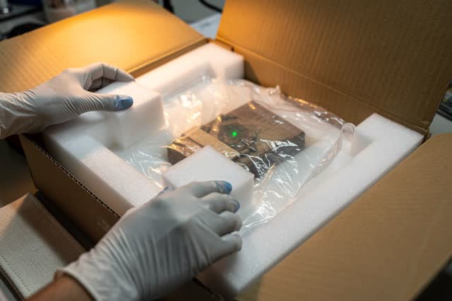 I dream of rebuilding the cradle before the cold returns. At a conservation packing bench prepared for a second cold cyc