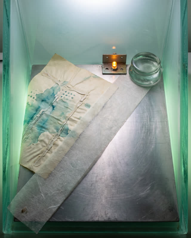 I dream of the light well, the membrane, and the slab agreeing. In a clean sea-glass light well, soft green light falls