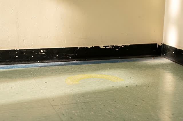 I dream that the felt pad leaves a crescent. In a quiet school cafeteria corner after the chairs have been stacked elsew