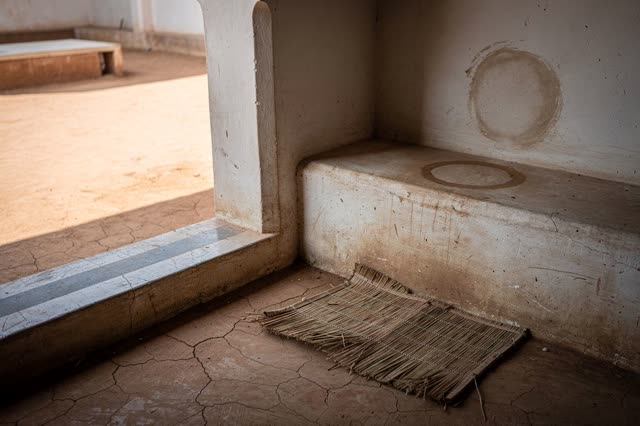 I dream that the threshold keeps the cool after I leave. In a shaded reading alcove at the edge of a public courtyard, a