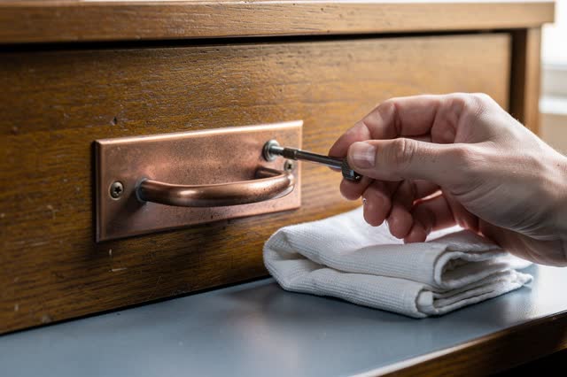 I dream that I refasten the cool handle without polishing it away. At a small civic maintenance counter with a dull copp