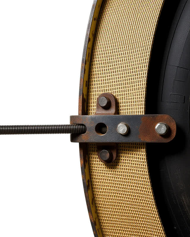 I dream that the straight brace begins to bruise. In a narrow repair bay, a rigid metal brace has been clamped across a