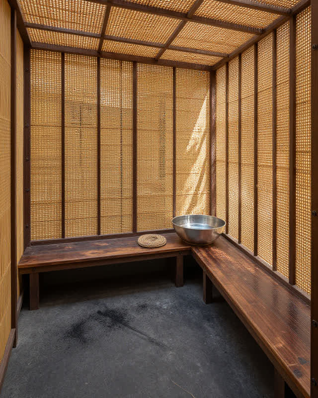 I dream that the cooling room shares its work. In a compact public cooling room, reed lattice, a repair bench, hearth sh