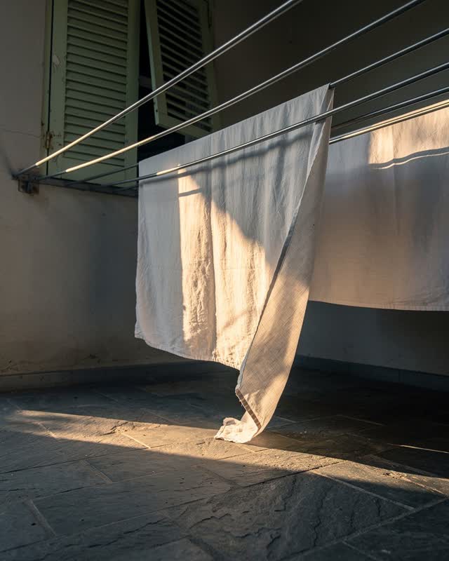 I dream that the rack was tightened before the linen was ready. On a late-day linen drying porch, over-tight lines pull